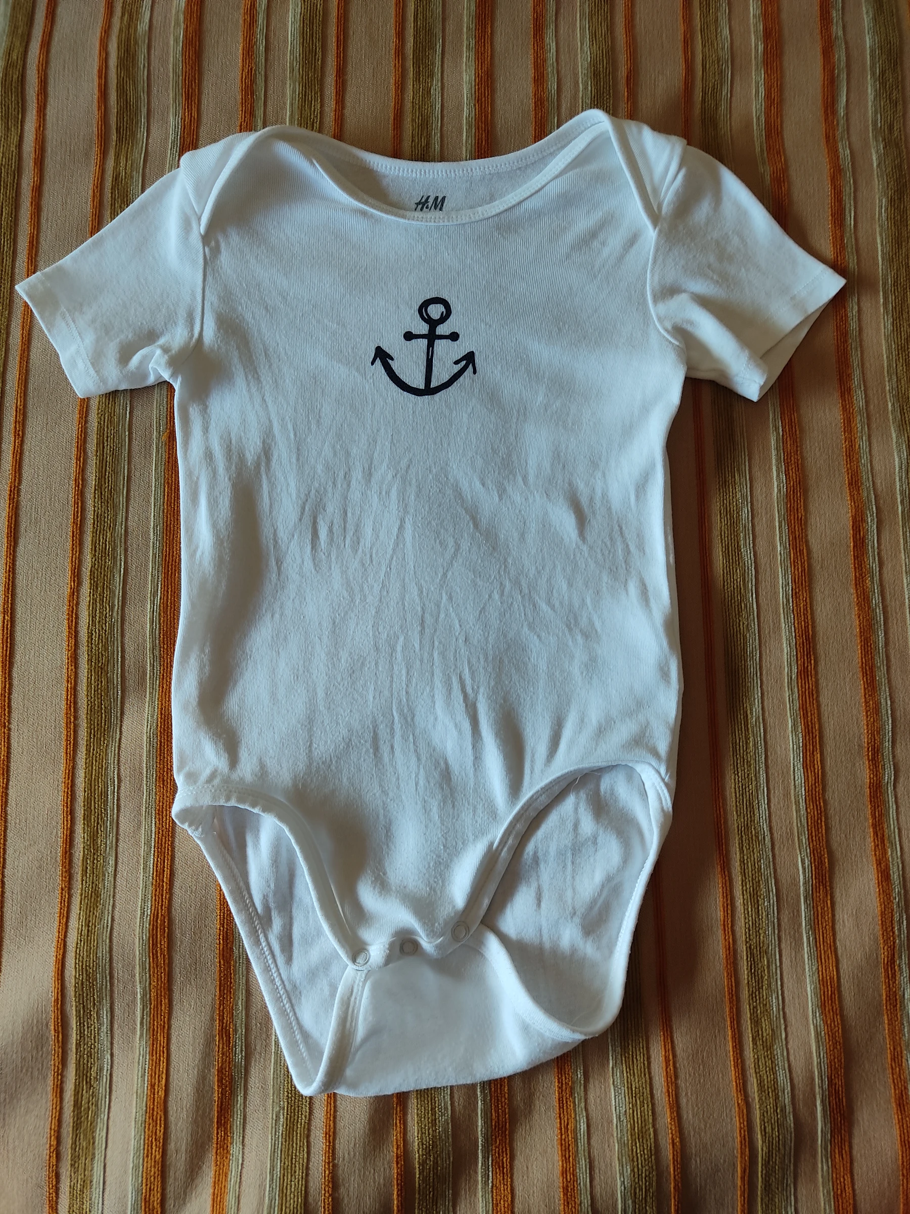 Body de manga corta. Talla 104 cm (3-4 A).H&M